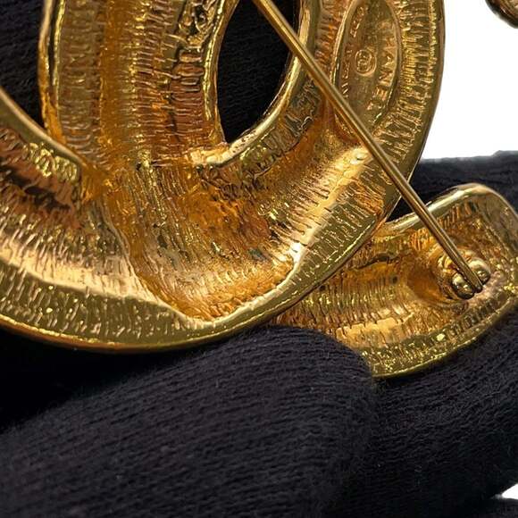 CHANEL Gold Logo Brooch
